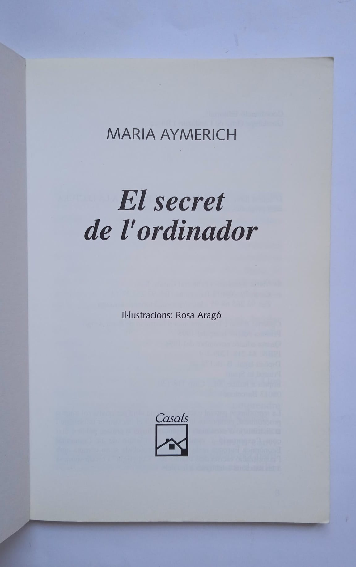 Libros de Casals Jove: Sota el volcà lila y  El secret de l'ordinador. 1998